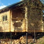 Bathhouse on screw piles on a slope