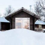 The bathhouse attached to the left looks harmonious with the one-story guest house