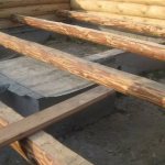 Round timber floor joists